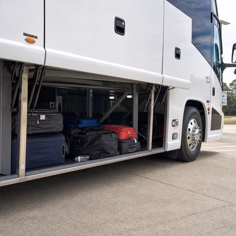 Party bus interior with wraparound leather seating and LED lighting in Kansas City