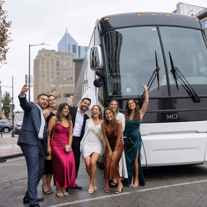 Passengers loading luggage while boarding an Kansas City group shuttle