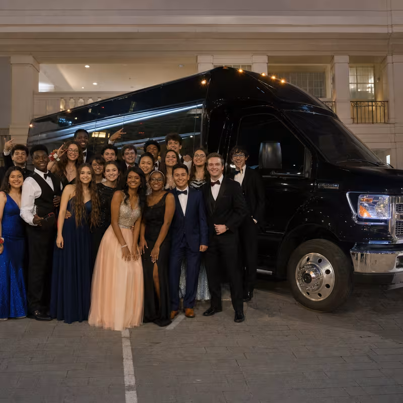 Party bus interior with wraparound leather seating and LED lighting in Kansas City
