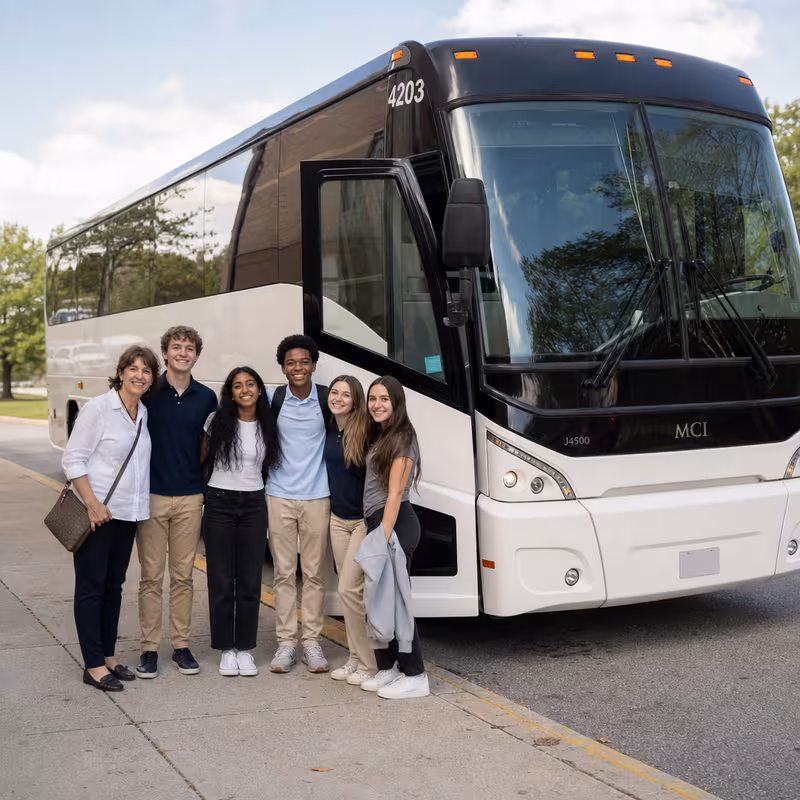 Passengers loading luggage while boarding an Kansas City group shuttle