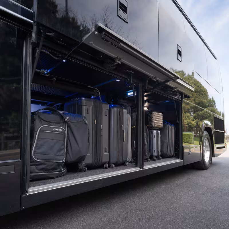 Party bus interior with wraparound leather seating and LED lighting in Kansas City