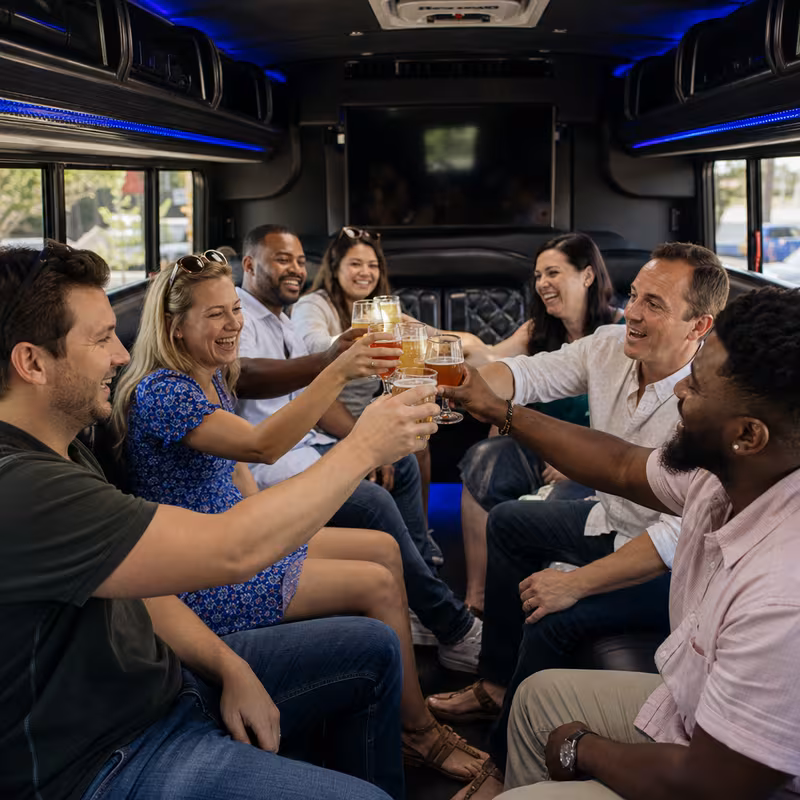 Group boarding a white charter bus for Winery & Brewery Tour Transportation transportation in Kansas City